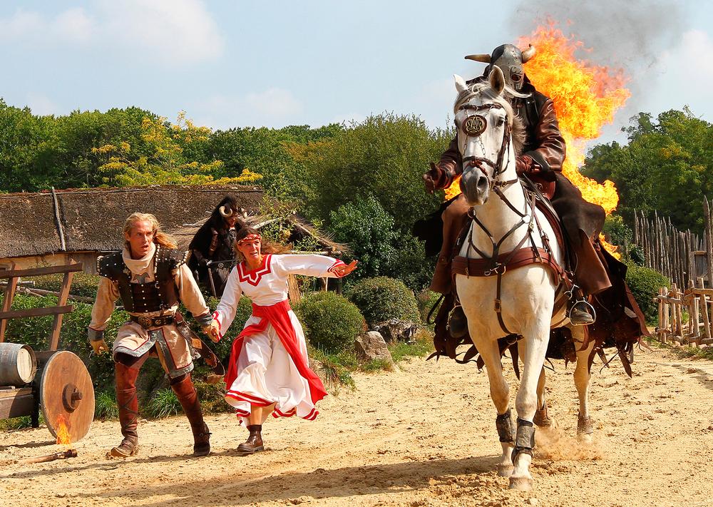 Viking warriors launch an attack as part of the Vikings Grand Show at Puy du Fou