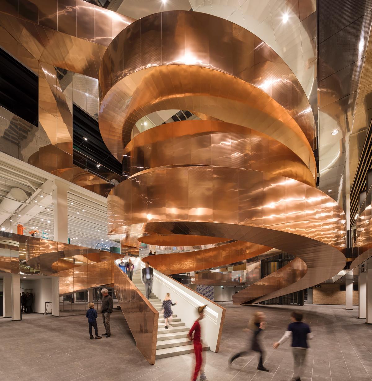 The interior of the building is dominated by an impressive double helix staircase – inspired by the structure of DNA The interior of the building is dominated by an impressive double helix staircase – inspired by the structure of DNA