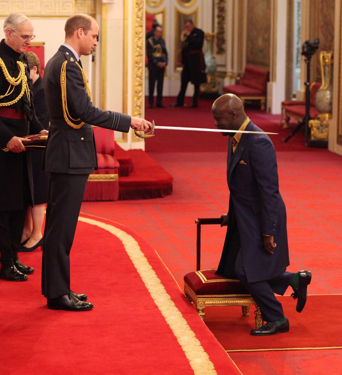 Sir David Adjaye being knighted.