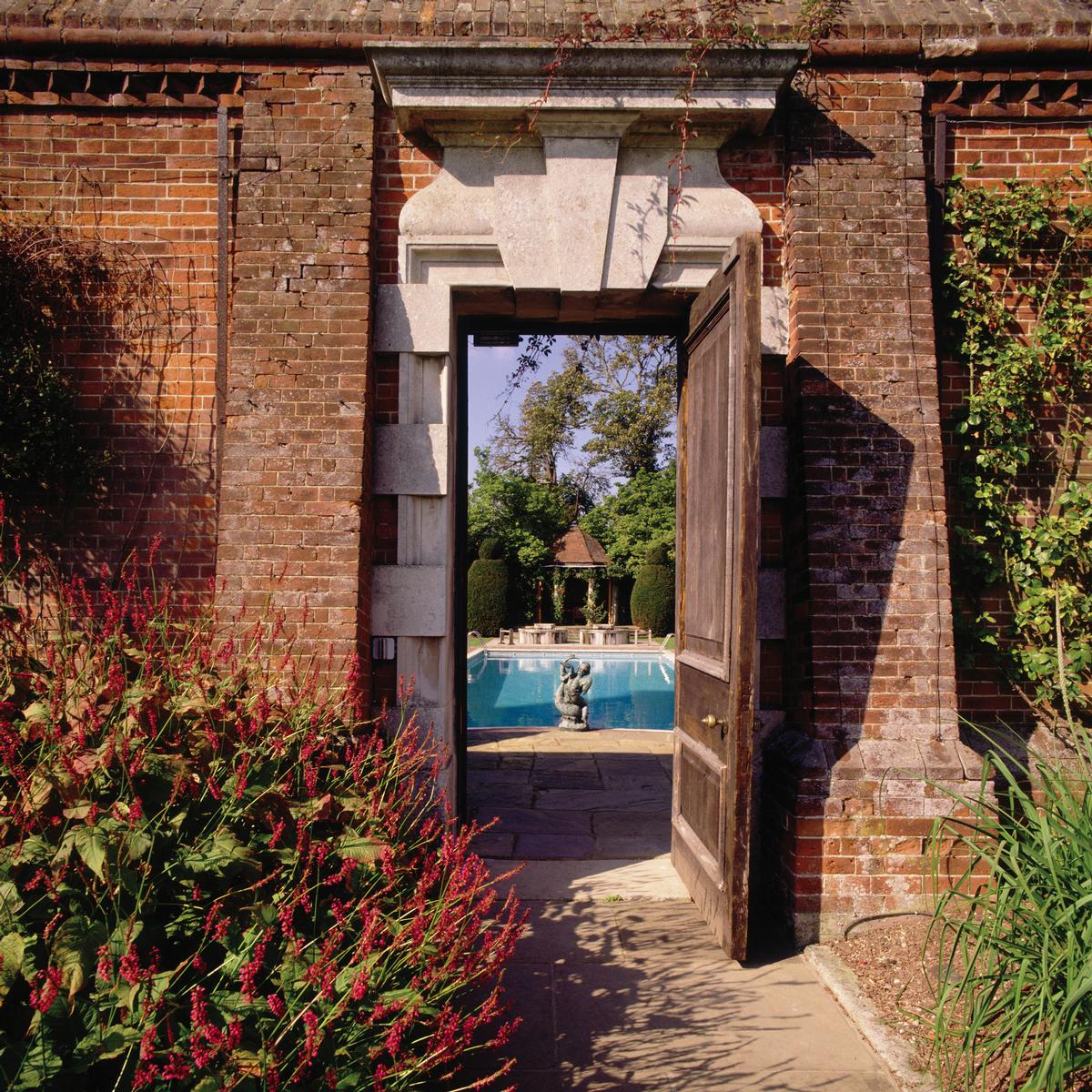 The entrance to the spa and Hatherley Manor's famous walled garden / 