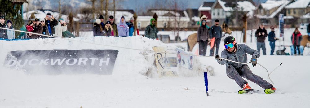 Both ski tips and both boots must go around each obstacle when racing