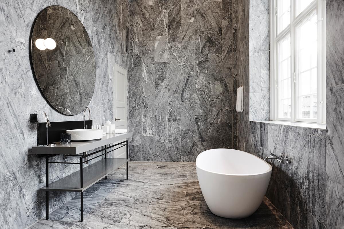 The bathrooms are outfitted in Bardiglio Nuvolato marble / Design Hotels