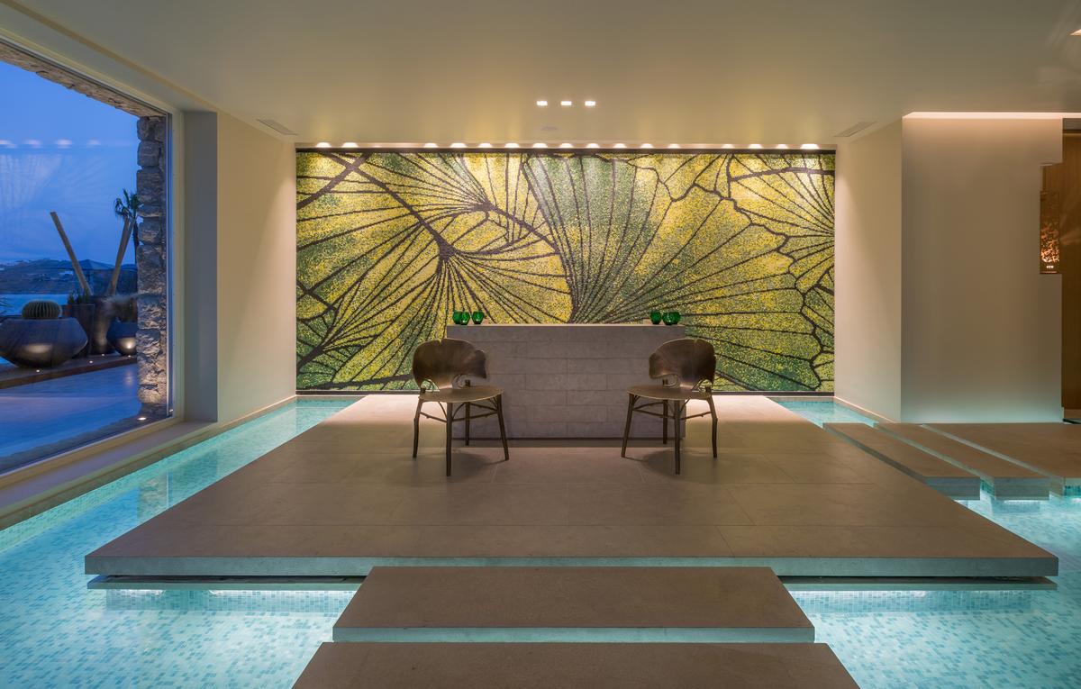 The new spa includes five large treatment rooms and flowing water adding to the serenity of the relaxation area / 