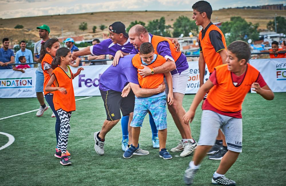 Young people using the football pitch at Cañada Real are also given education