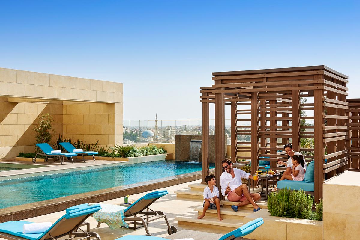 The Dead Sea pool uses water from the salt lake and mud treatments use Trinitae Dead Sea products / Fairmont
