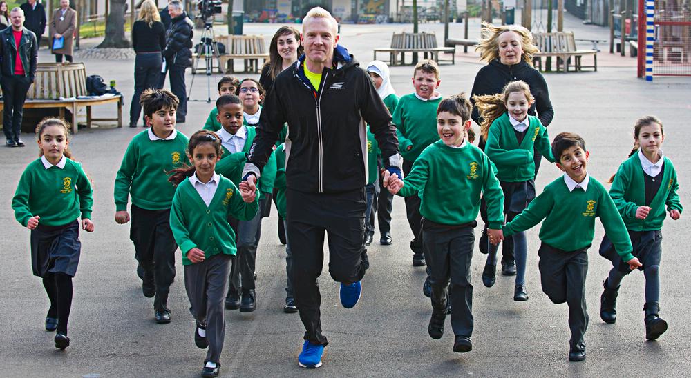 Olympic sprinter Iwan Thomas leads a Daily Mile