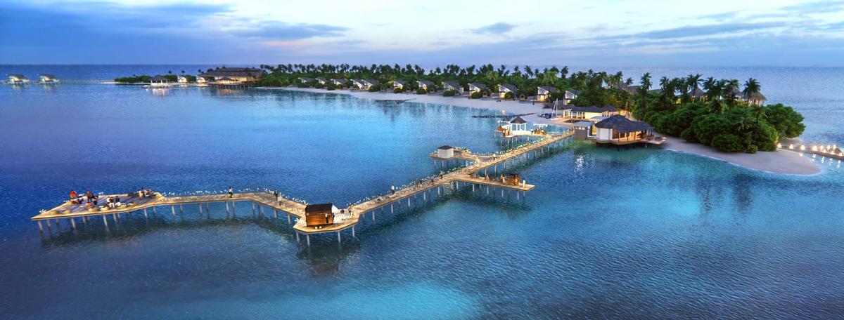 The resort will have 29 one- and two-bedroom beach villas and 32 overwater villas set on stilts over the Laccadive Sea / 
