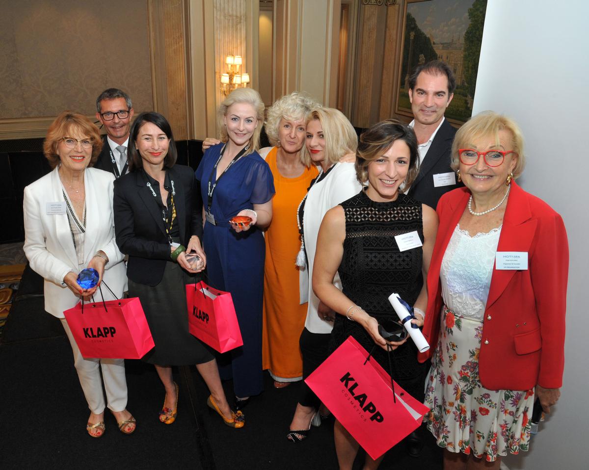 Vladi Kovanic, far right front, poses with organisers and Diamond Award winners, including Erica D'Angelo, to her right