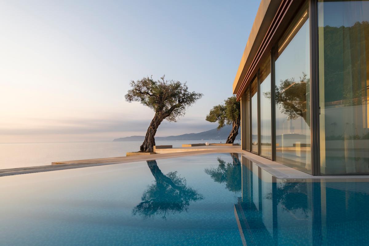 The beachfront retreat is one of a trio of Domes Resorts in Greece, and currently features a boutique spa, with plans for a larger one in the future / 