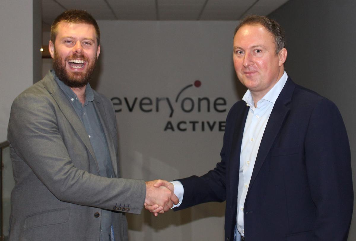 Eamon Lloyd, director, head of partnerships for UK at Gympass (left) and Everyone Active's regional director Duncan Jefford signing the deal