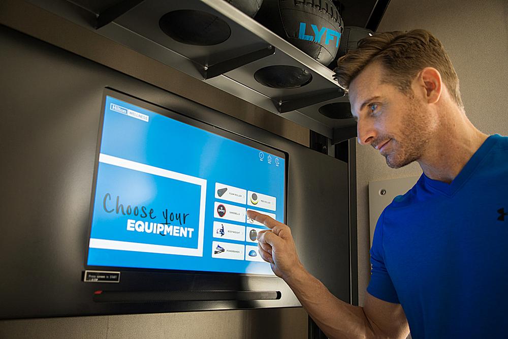 The Fitness Kiosk is a touch-screen display embedded in the Gym Rax system