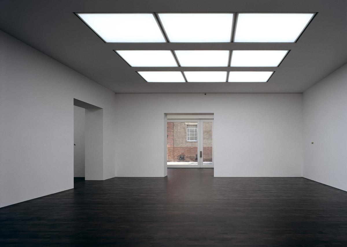 The 1,600sq m (17,200sq ft) gallery is centrally lit, with dark oak wood floors for contrast