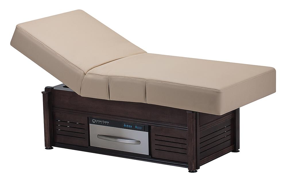 The stylish new warming drawer slides seamlessly under the massage table and has a number of uses