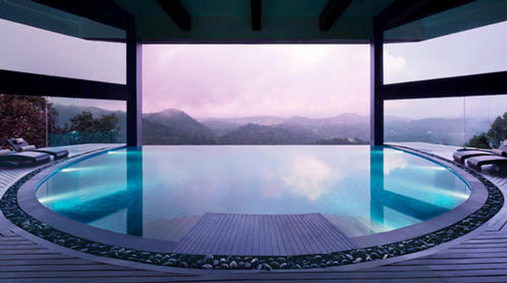 The spa is spread over three levels with views of the rainforest / 