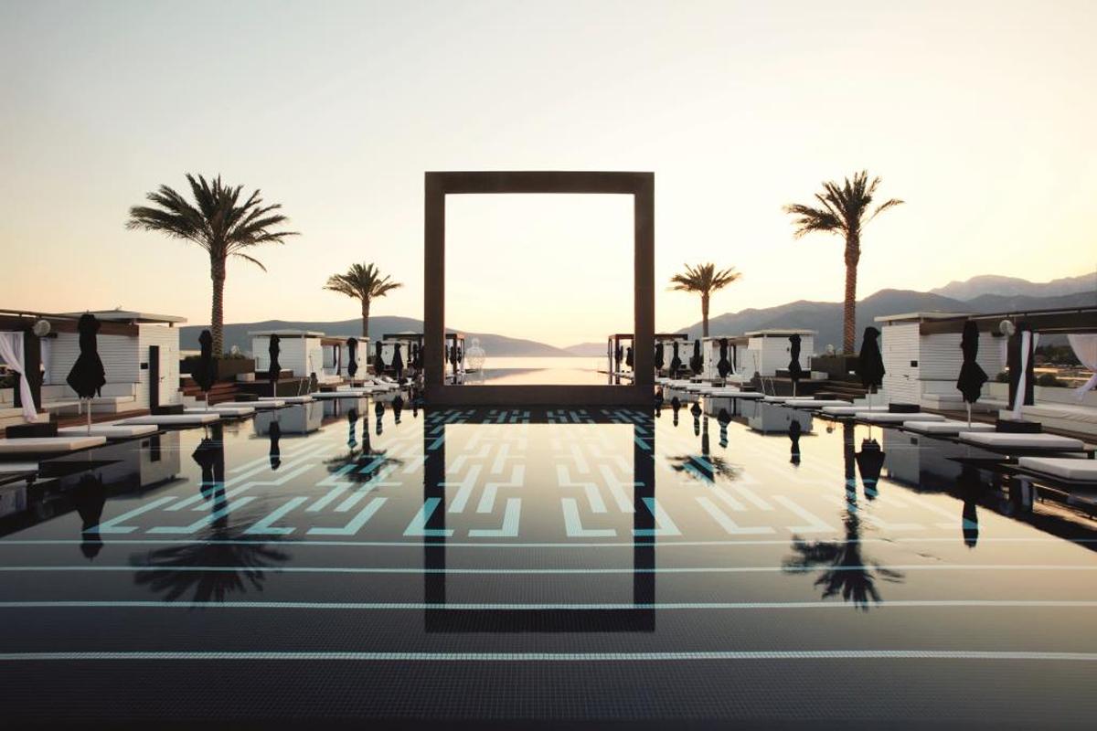 Hotel guests have priority access to Lido Pool, a 64m (210ft) outdoor infinity pool and lounge within the marina village / Regent Hotels & Resorts