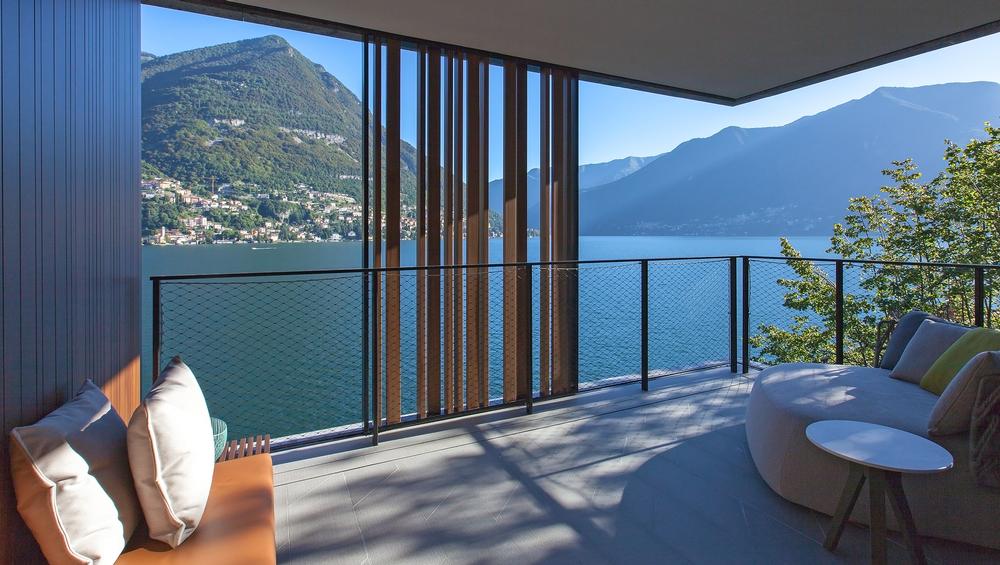 Each of the 30 guest rooms has its own terrace with views of Lake Como. Urquiola designed furniture, lamps, wall coverings and rugs for the bedrooms and public spaces