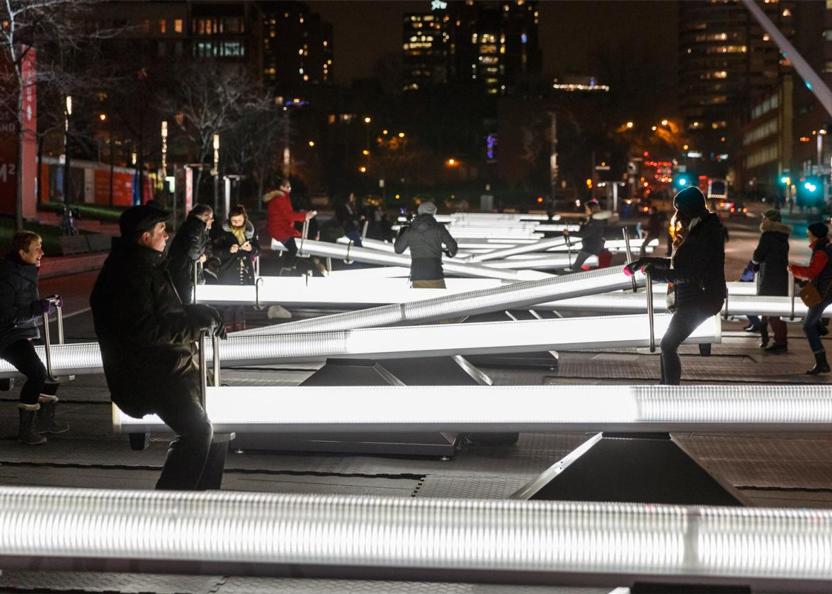 Each seesaw is fitted with LEDs and speakers and emits waves of light and sound / Ulysse Lemerise