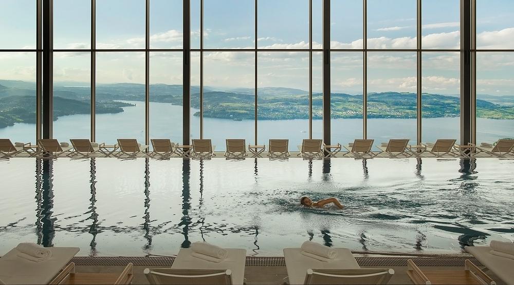 The resort’s 100,000sq ft spa is perched on a cliff, 450m above Lake Lucerne