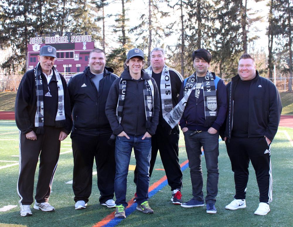Crowley (centre) with the club’s coaching and management team