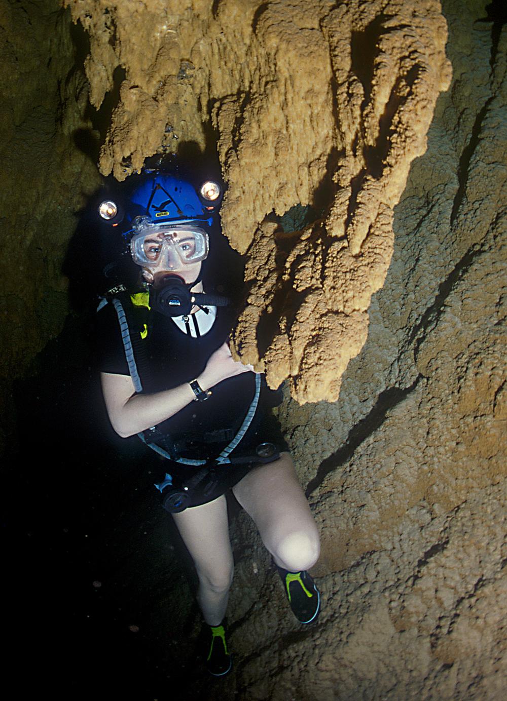 The underground cave has a lake deep enough to swim and scuba dive in