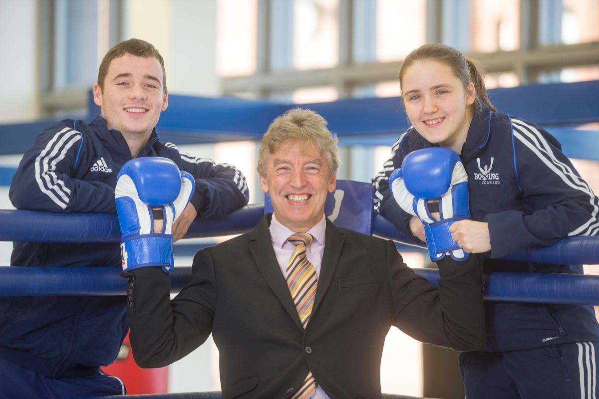 Mike Whittingham (centre) with Stephanie Kernachan and Reece McFadden, who won a bronze medal in boxing at the 2014 Glasgow Commonwealth Games