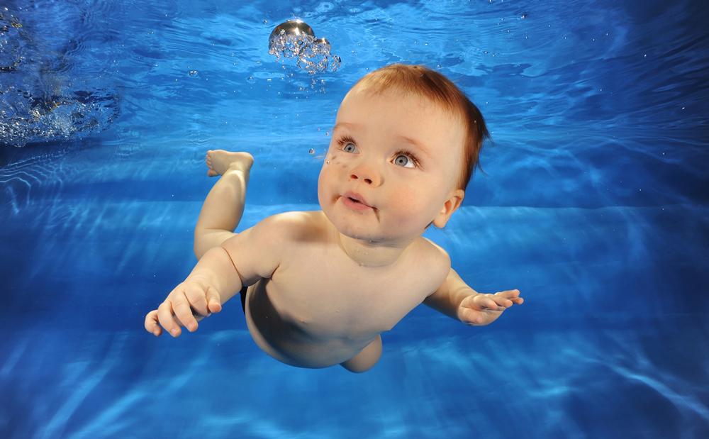 After gaining confidence, babies swim independently in their second year / jez dixon / waterbabies