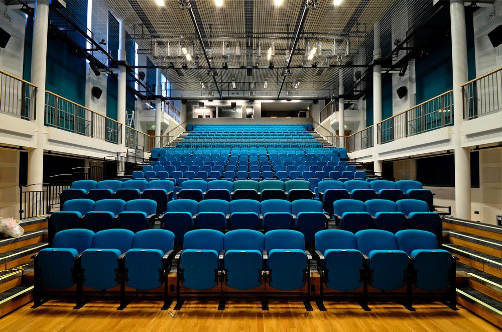 The seating can slide away, allowing the theatre space to be used for alternative events