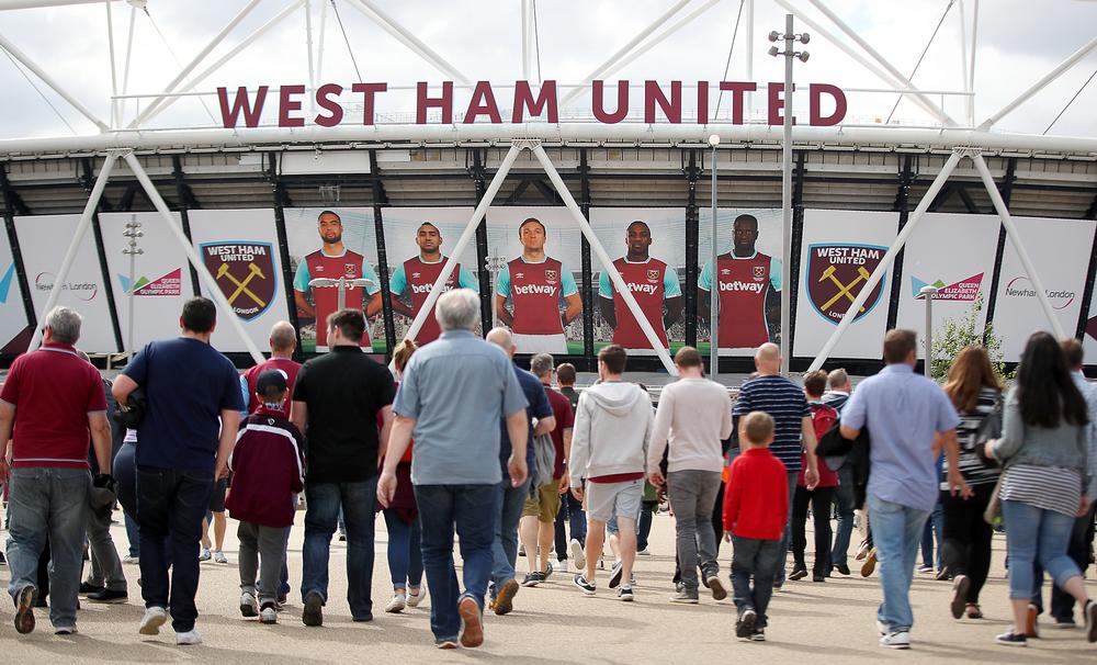 Fans walk to the stadium via its spacious surroundings in a far cry from the tight streets around Upton Park / image ©: nick potts / press association