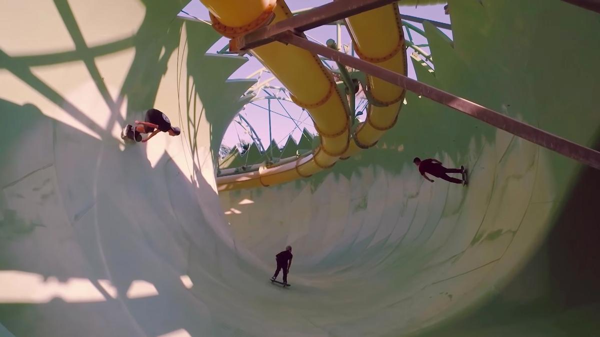 The video, released 11 April, sees the three skateboarders riding down six storeys and 156m of twists and turns