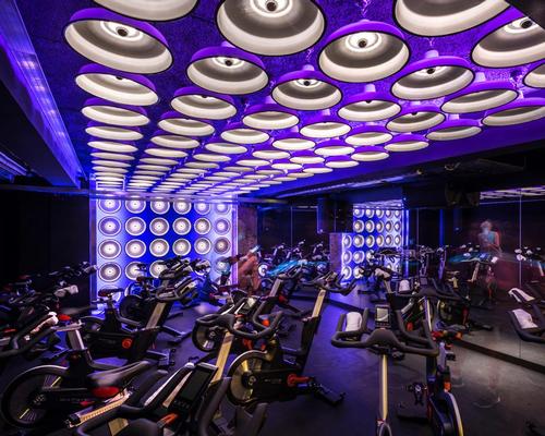 Colour changing LED lighting creates low, warm and energised space for spinning and expanded, cool and focused space for yoga / WG+P