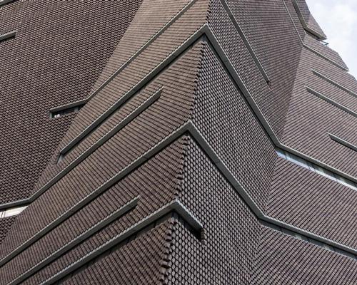 The power station’s brickwork is reinterpreted with a new perforated lattice of 336,000 bricks / Iwan Baan