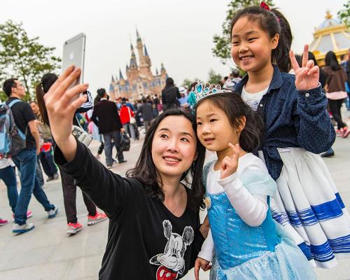 The poor weather didn't deter visitors, who showed up in the tens of thousands / Disney