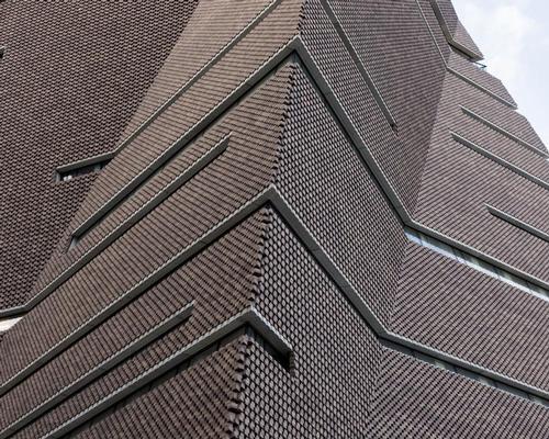 The power station’s brickwork is reinterpreted with a new perforated lattice of 336,000 bricks / Iwan Baan
