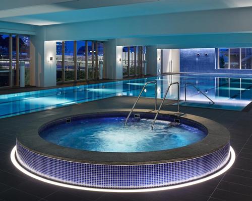 The facility is designed to promote personal sports training, Japanese bathing and social activities / Kei Takashima