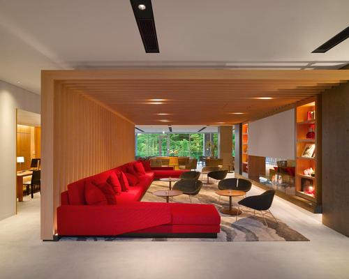 Social elements include a lounge, bar, dining room and cafe with outdoor terrace / Roland Hable