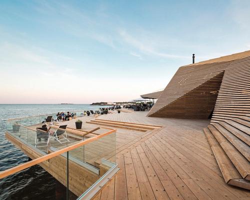 The sauna's terrace doubles as an outdoor auditorium for marine sports / kuvio.com