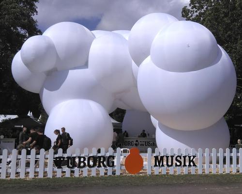 Bjarke Ingels Group have designed an inflatable beer pavilion for the Roskilde Music Festival in Denmark / Carslberg