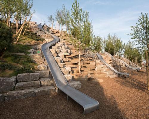 Four slides descend Slide Hill / Timothy Schenck