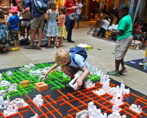 Tasks include experimenting with different city layouts / ArchiKids