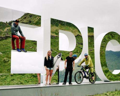 The four-metre-high letters reflect their 'EPIC' surroundings 