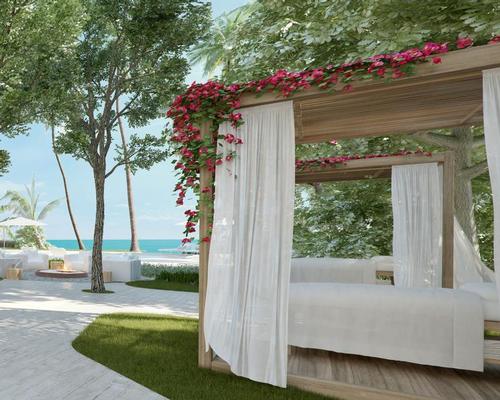 Two outdoor treatment cabanas take advantage of the serene shoreline setting