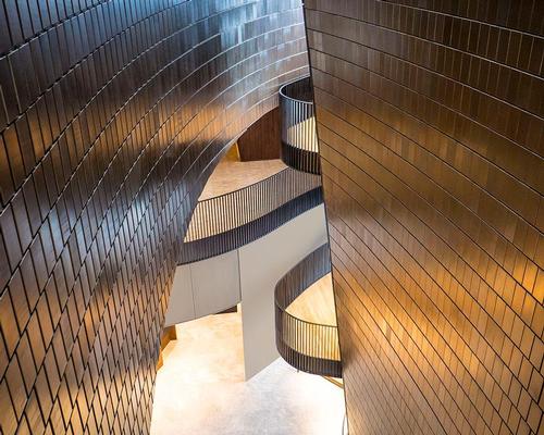 The walls curve and merge like 'gravity and acoustics' / Brandon Wallis
