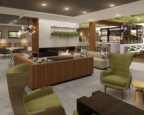 The interiors feature abundant use of green / Wyndham Hotel Group