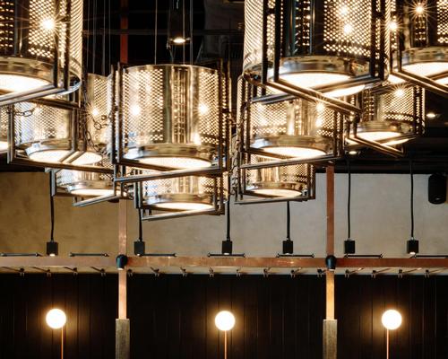 Washing machine drums were smoked under a flame then bathed in vinegar to create a refined finish
/ Joyce Wang Studio
