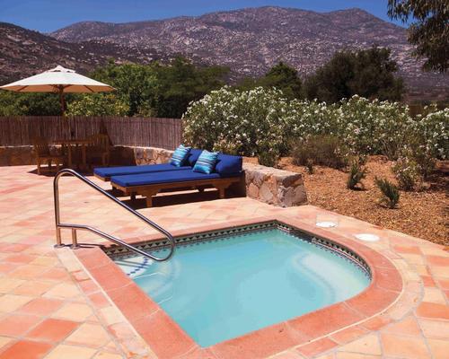 The plunge pool is heated with solar panels and its water – periodically drained and refreshed – is reused for gardening