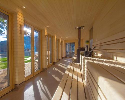Sauna users can enjoy a session in the crackling heat before leaping into the loch / McKenzie Strickland Associates