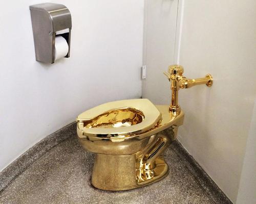 The art exhibit is located inside a unisex bathroom / Twitter