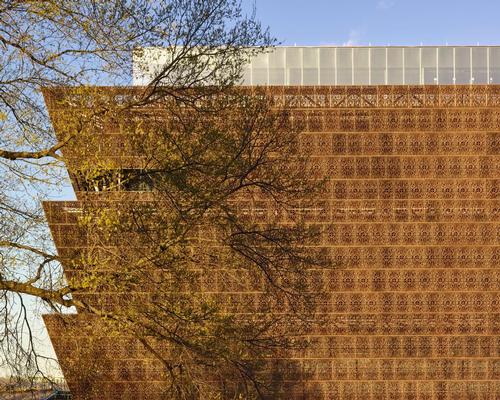 The most significant component of the design is the bronze crown-like Corona, which forms the visible exterior of the building / Alan Karchmer/NMAAHC