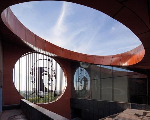 A view from the top of the building looks out at the city and museum gardens / André J Fanthome