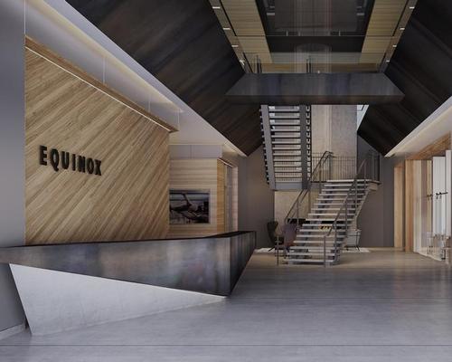 Designed to echo “Pacific Northwest sensibilities”, Equinox Vancouver‘s interior boasts bleached walnut woods, concrete floors and reflective metallics